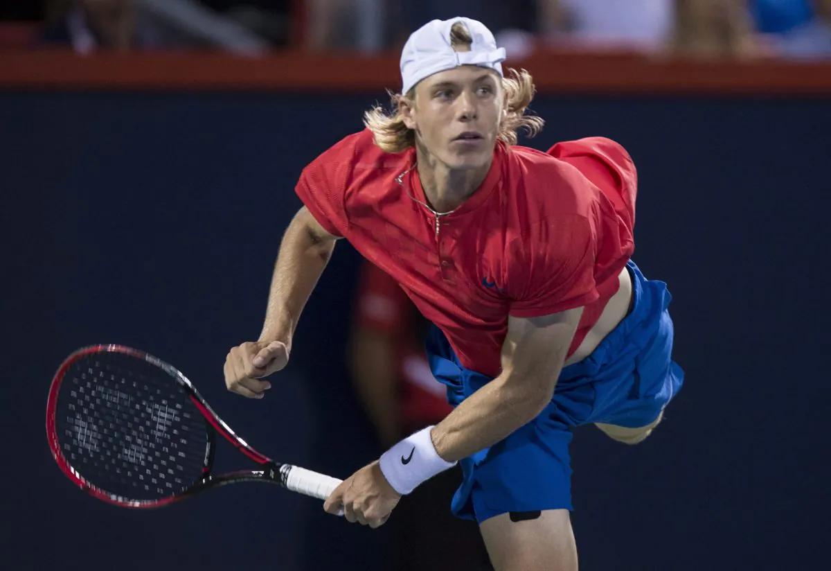 Canadian Denis Shapovalov hits a serve to Alexander Zverev of Germany in semifinal action at the Rogers Cup on Aug. 12, 2017 in Montreal. (The Canadian Press/Paul Chiasson)