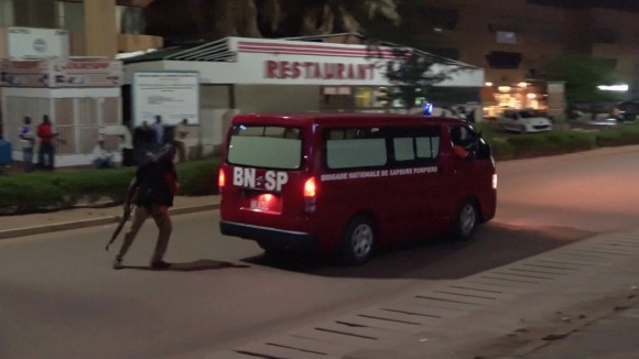 A fire brigade vehice departs following an attack by gunmen on a restaurant in Ouagadougou, Burkina Faso, in this still frame taken from video August 13, 2017. REUTERS/Reuters TV