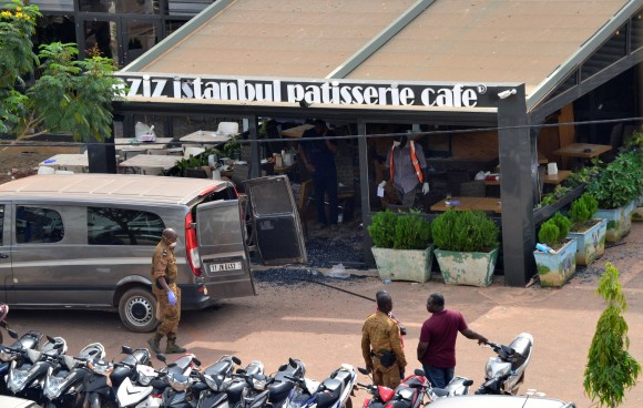 Security forces stand outside the Aziz Istanbul restaurant after an overnight raid in Ouagadougou, Burkina Faso August 14, 2017. REUTERS/Bonaventure Pare