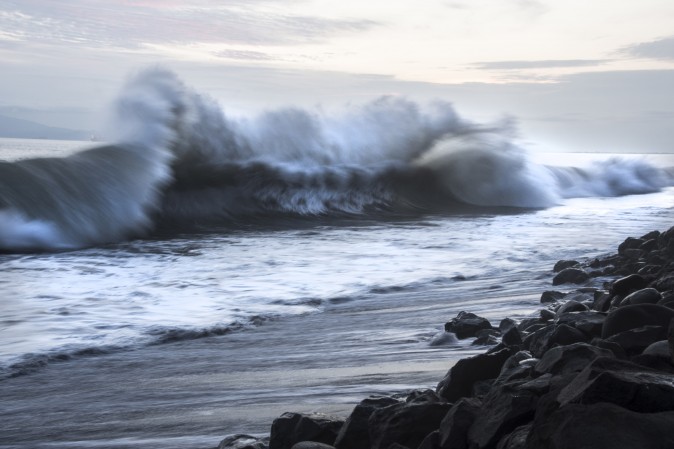 Heavy waves caused by offshore storms crash on a beach in Puntarenas, Costa Rica, on Aug. 13, 2017. (EZEQUIEL BECERRA/AFP/Getty Images)