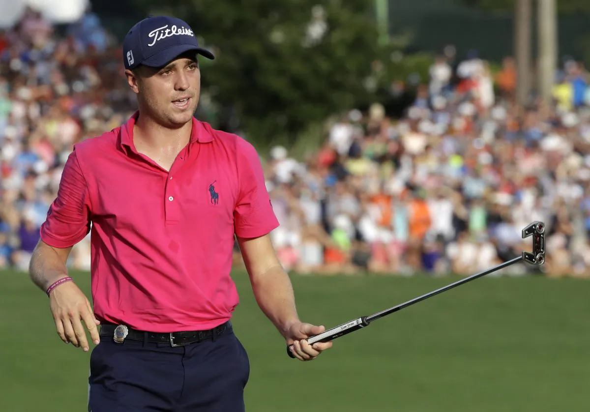 Justin Thomas celebrates after the final round of the PGA Championship at the Quail Hollow Club on Aug. 13, 2017, in Charlotte, N.C. (AP Photo/Chris O'Meara)