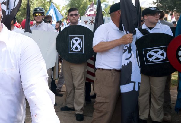 James Alex Fields Jr., (2nd L with shield) is seen attending the "Unite the Right" rally