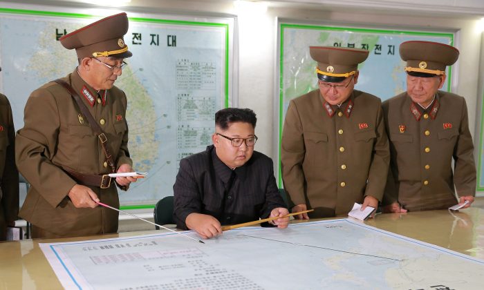 North Korean leader Kim Jong Un visits the Command of the Strategic Force of the Korean People's Army (KPA) in an unknown location in North Korea in this undated photo released by North Korea's Korean Central News Agency (KCNA) on August 15, 2017. (KCNA/via Reuters)