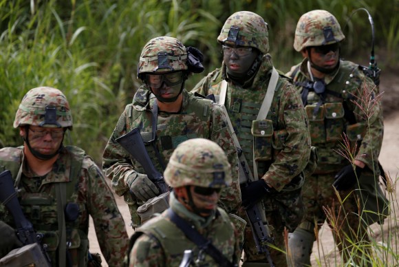 Japan Ground Self Defense Force members take part in their joint exercise, named Northern Viper 17, with U.S. Marine Corps at Hokudaien exercise area in Eniwa, on the northern island of Hokkaido, Japan, August 16, 2017. (Reuters/Toru Hanai)