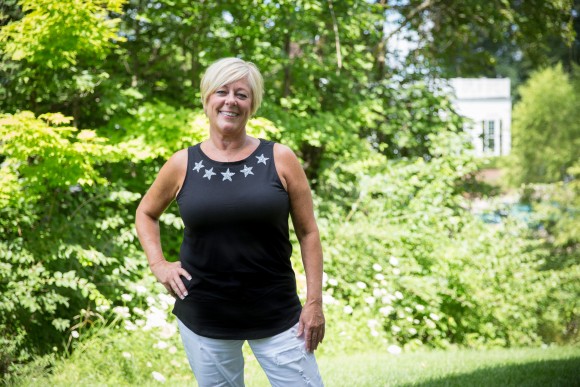 Amy Blazitz, 62, outside her home in Gahanna, Ohio, on Aug. 5. (Benjamin Chasteen/The Epoch Times)