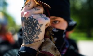 Suspected Antifa Member Who Accosted 9/11 Widow Gets Fired