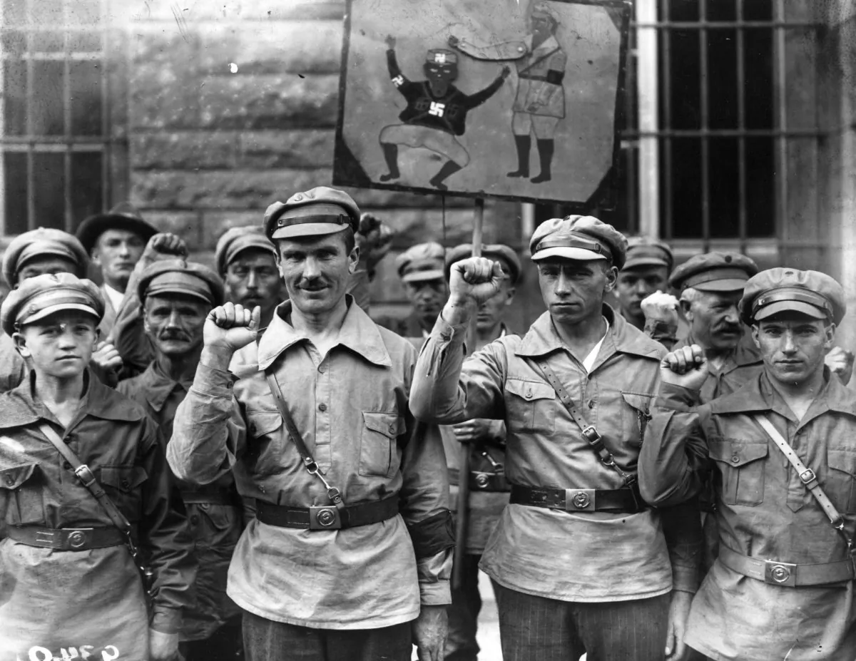 Members of the far-left Antifa extremist organization give a clenched fist salute on Sept. 1, 1928. The group's original intent was to bring out a communist dictatorship in Germany. (Fox Photos/Getty Images)