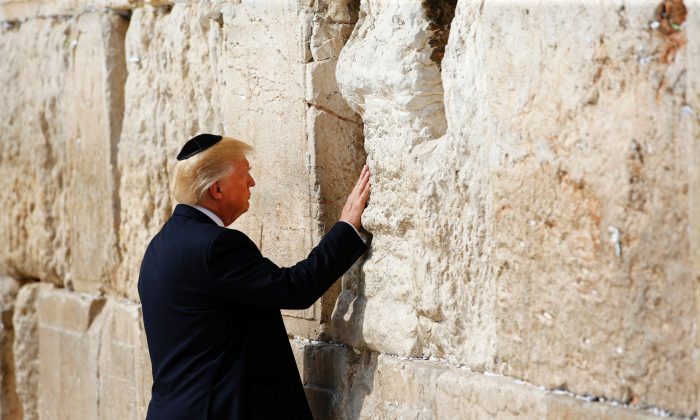 President Donald Trump prays at the Western wall in Jerusalem on May 22, 2017. (RONEN ZVULUN/AFP/Getty Images)