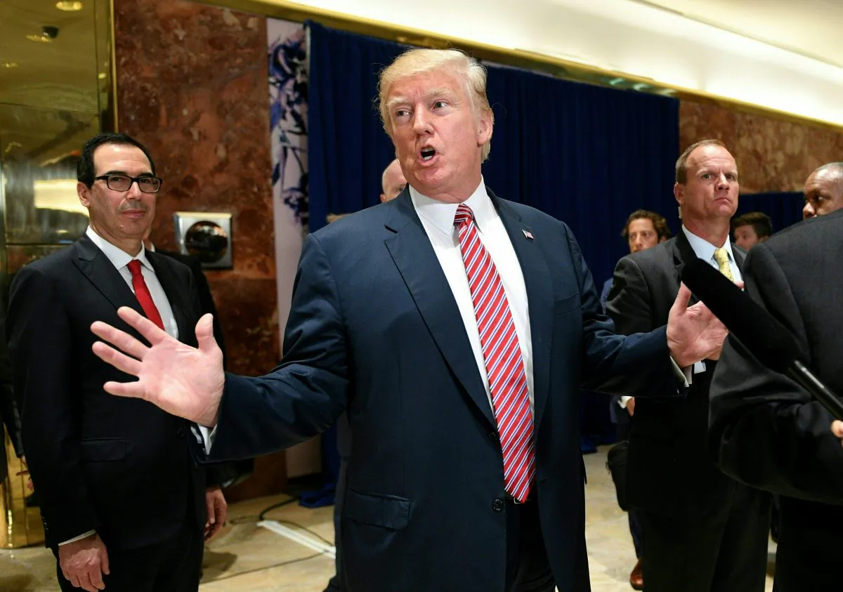 President Donald Trump answers questions about protests in Charlottesville after a statement on infrastructure at Trump Tower in New York on Aug. 15, 2017. (Jim Watson/AFP/Getty Images)
