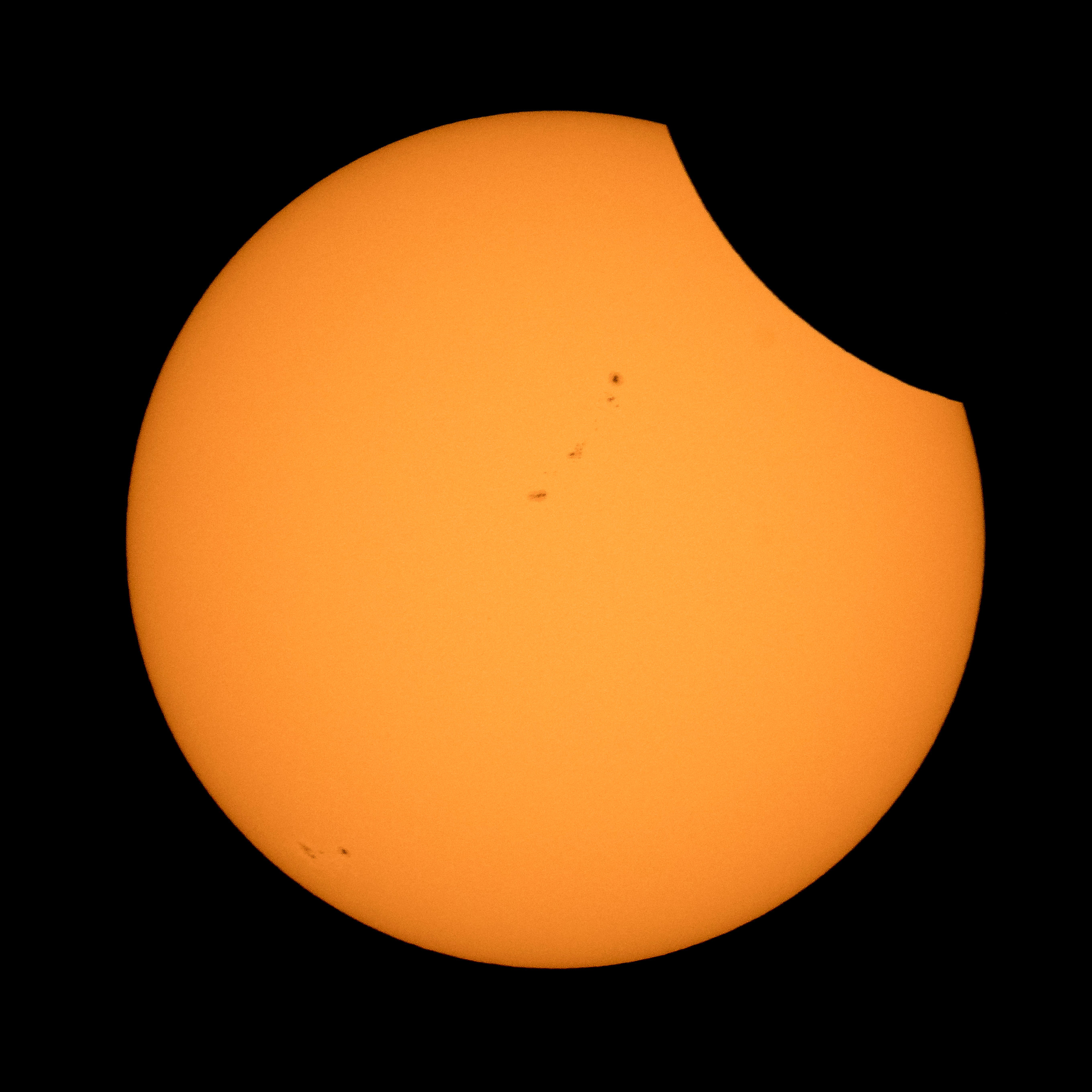The moon starts passing in front of the sun during a solar eclipse seen from Ross Lake, Northern Cascades National Park, Washington, U.S., August 21, 2017. (Courtesy Bill Ingalls/NASA/Handout via REUTERS)