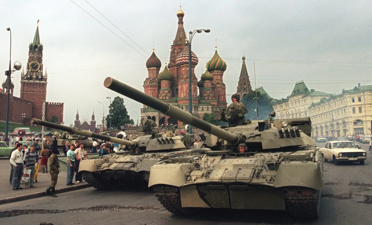 A picture taken on August 19, 1991 shows Soviet Army tanks parked near Spassky gate (L), an entrance to the Kremlin and Basil's Cathedral (C) in Moscow's Red Square after a coup toppled Soviet President Mikhail Gorbachev.
(Dima Tanin/AFP/Getty Images)