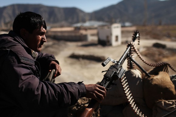 A member of the Afghan National Police keeps watch in Zerak, Afghanistan, on Jan. 21, 2010. (Spencer Platt/Getty Images)