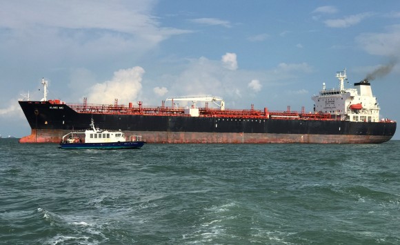 Tanker Alnic MC is seen in Singapore waters after a collision with U.S. Navy USS John S. McCain, August 21, 2017. (Reuters/Christoph Van Der Perre)