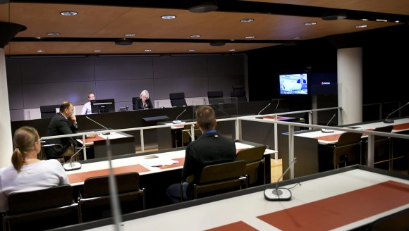The initial remand hearing of Abderrahman Mechkah (lying in a hospital bed, attending the court session via video), 18 year-old Moroccan man suspected of killing two people and attempting to kill eight others with terrorist intent in Turku, on Friday, August 19, is held at Southwest Finland District Court in Turku, Finland, August 22, 2017. (Lehtikuva/Martti Kainulainen via Reuters)