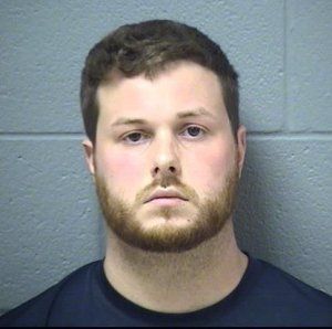 Sean B. Woulfe, 25, was charged with 16 counts of reckless homicide, including two counts of reckless homicide of an unborn child (Will County Sheriff's Department)