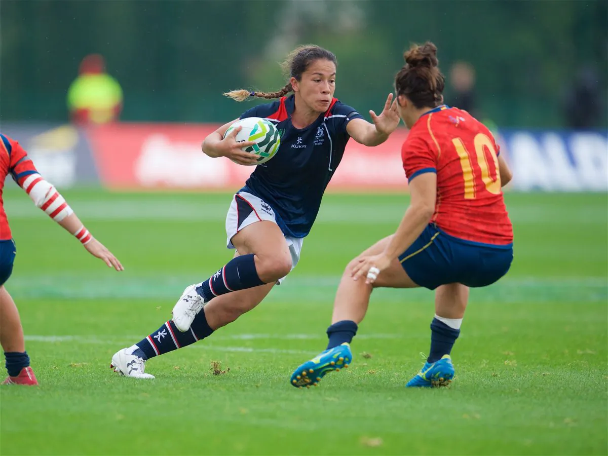 Rose-hopewell-fong-of Hong Kong battles-past-her-opposite-no-20-patricia-garcia-of-Spain in the 9th place semi-final of the Women's Rugby World Cup, in Belfast, on Tuesday Aug 22, 2017. (Hong Kong Rugby)