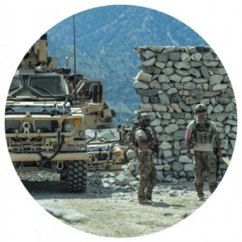 U.S. soldiers patrol in the Achin district of Afghanistan's Nangarhar Province on April 15. (PHOTO BY GETTY IMAGES)  