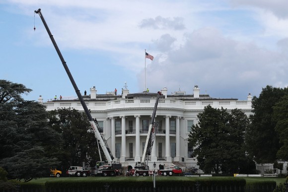 Cranes are seen on the South Lawn of the White House Aug. 8, 2017 in Washington, DC. The White House is underwent a major renovation while President Donald Trump stayed in Bedminster, New Jersey, with an upgrade of the HVAC system at the West Wing, the South Portico steps, the Navy mess kitchen, and the lower lobby. (Alex Wong/Getty Images)