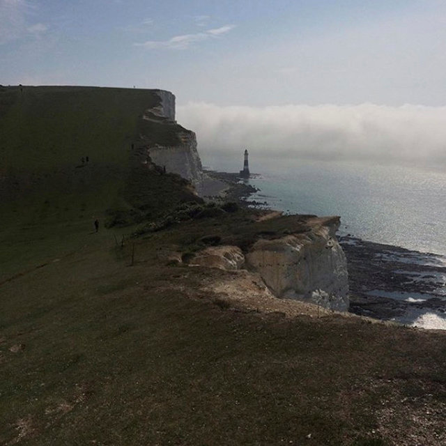 Mist is seen near the Beachy Head Lighhouse near Eastbourne, Britain on Aug. 27, 2017. (Louisa Neale via REUTERS)