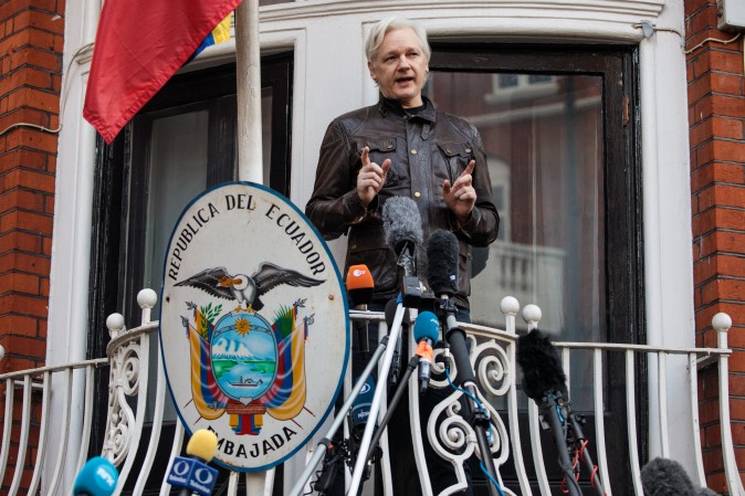Julian Assange speaks to the media from the balcony of the Embassy Of Ecuador in London on May 19. (Jack Taylor/Getty Images)