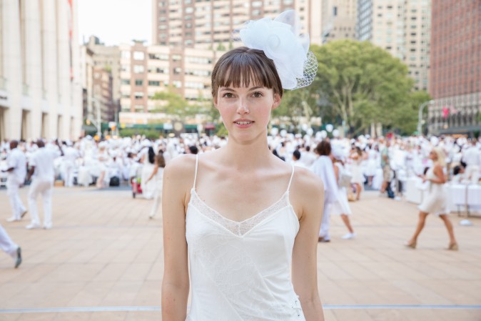 Guests attend the annual Diner en Blanc at Lincoln Center in New York on Aug. 22, 2017. Diner en Blanc began in France nearly 30 years ago. (Eric Vitale for Diner en Blanc) 