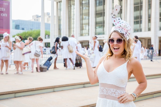 Guests attend the annual Diner en Blanc at Lincoln Center in New York on Aug. 22, 2017. Diner en Blanc began in France nearly 30 years ago. (Eric Vitale for Diner en Blanc) 