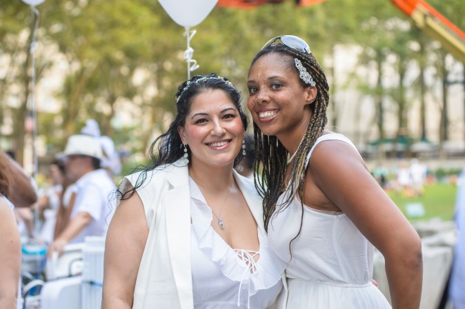 Guests attend the annual Diner en Blanc at Lincoln Center in New York on Aug. 22, 2017. Diner en Blanc began in France nearly 30 years ago and is held around the world. (Jane Kratochvil for Diner en Blank) 