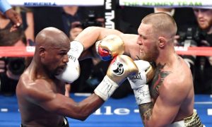 Conor McGregor's Gloves Were Laced Incorrectly in Mayweather Fight, Irish Boxing Champ Says