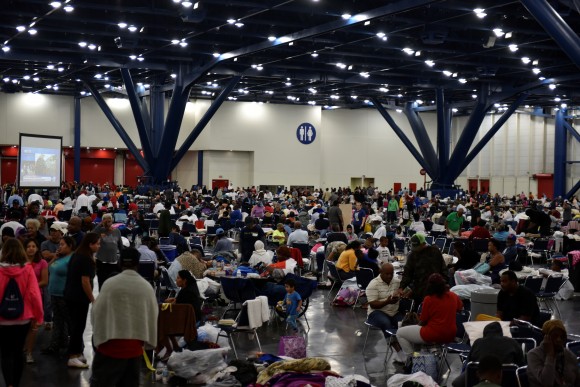 Evacuees fill an exhibition hall at the George R. Brown Convention Center where people have taken refuge in Houston, Texas, U.S. August 29, 2017.  (Reuters/Nick Oxford)