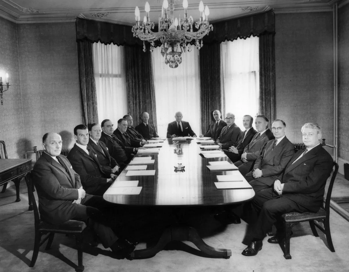 The Board of Directors of Fisons Ltd., manufacturers of fertilizers, attend a meeting in the company's boardroom, on June 7, 1960. (Central Press/Getty Images)