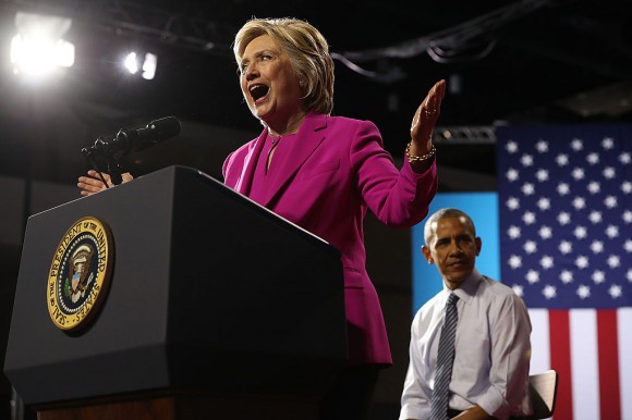 Democratic presidential candidate former Secretary of State Hillary Clinton walks off of Air Force One with U.S. president Barack Obama on July 5, 2016 in Charlotte, North Carolina. Hillary Clinton is campaigning with president Obama in North Carolina.