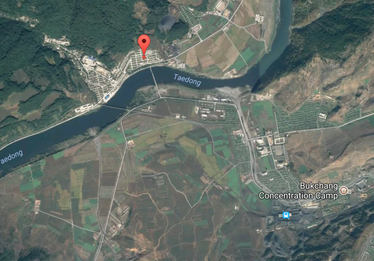 Satellite imagery shows the building clusters of the Kaechon political prison camp marked by a red dot. The prison camps often include huge swaths of wilderness area. The Kaechon camp is approximately 60 square miles in area and holds 15,000 prisoners. (Screenshot via Google Maps)