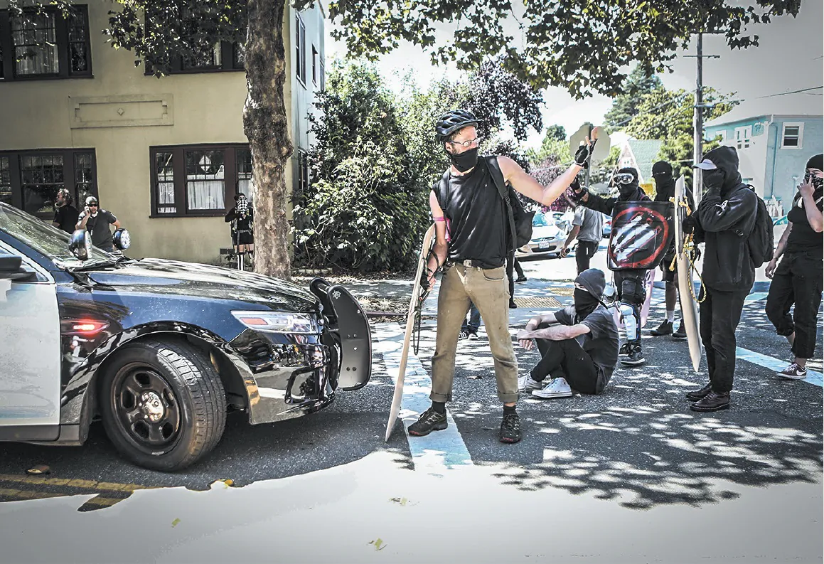 Far-left Antifa extremists prepare for a confrontation in Berkeley, Calif., on Aug. 27. The communist theory of dialectical materialism aims to incite conflict and struggle. (AMY OSBORNE/AFP/GETTY IMAGES)