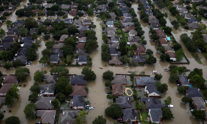 Houses are seen submerged in flood waters caused by Tropical Storm Harvey in Northwest Houston, Texas, U.S. August 30, 2017. (REUTERS/Adrees Latif)