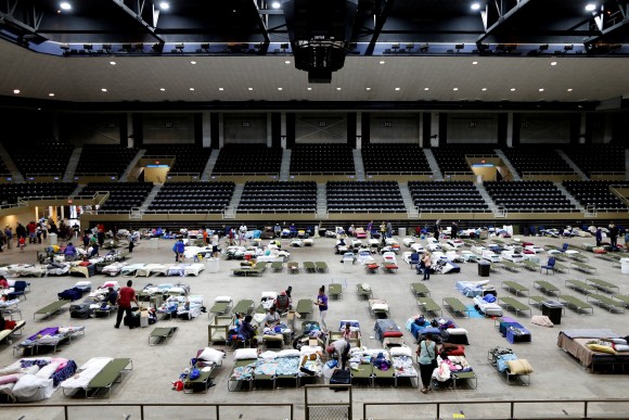 Evacuees from Tropical Storm Harvey fill the Lake Charles Civic Center in Lake Charles, Louisiana, U.S., on August 30, 2017. (REUTERS/Jonathan Bachman)