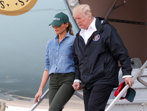 U.S. President Donald Trump and first lady Melania Trump deplane after arriving at Ellington Field to meet with flood survivors and volunteers who assisted in relief efforts in the aftermath of Hurricane Harvey, in Houston, Texas, U.S., September 2, 2017.   REUTERS/Kevin Lamarque
