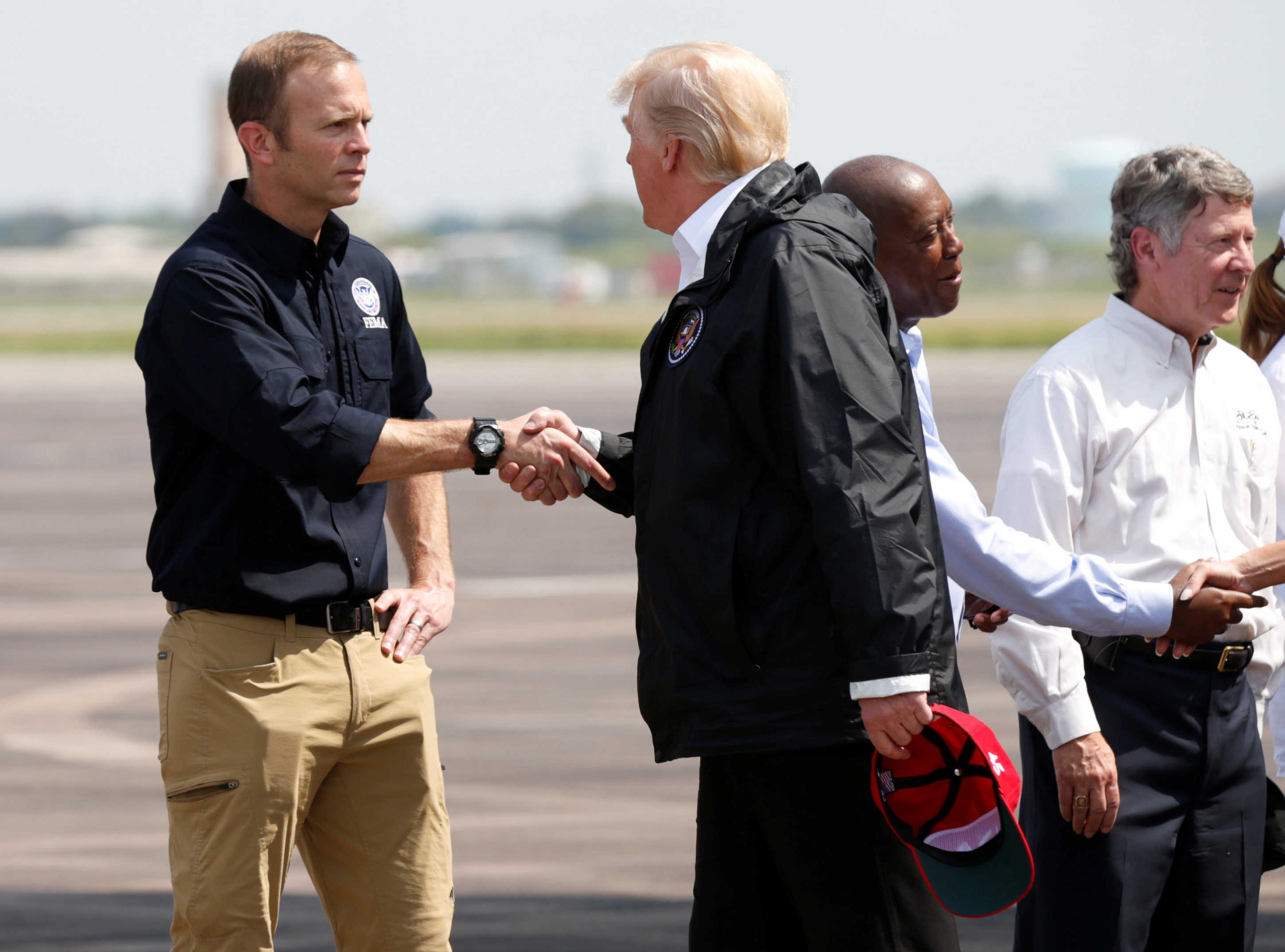 U.S. President Donald Trump meets FEMA Director Brock Long (REUTERS/Kevin Lamarque)
