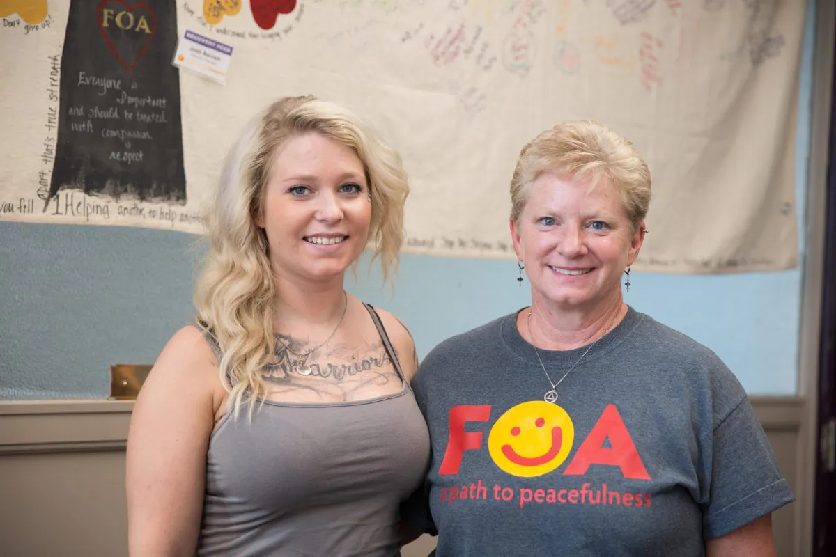 Recovering heroin addict April Erion (L) and her mother Lori Erion in Dayton, Ohio, on Aug. 2, 2017. Lori founded the support group FOA (Families of Addicts) after noticing a lack of resources for family members dealing with drug addicted loved ones. (Benjamin Chasteen/The Epoch Times)