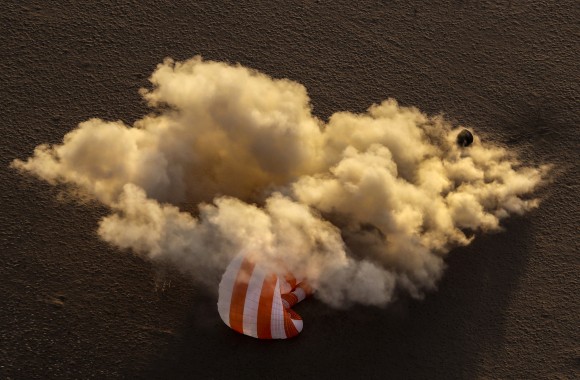 The Soyuz MS-04 capsule carrying the International Space Station (ISS) crew of Jack Fischer, Peggy Annette Whitson of the U.S. and Fyodor Yurchikhin of Russia lands in a remote area outside the town of Dzhezkazgan (Zhezkazgan), Kazakhstan September 3, 2017. (Reuters/Sergei Ilnitsky/Pool)