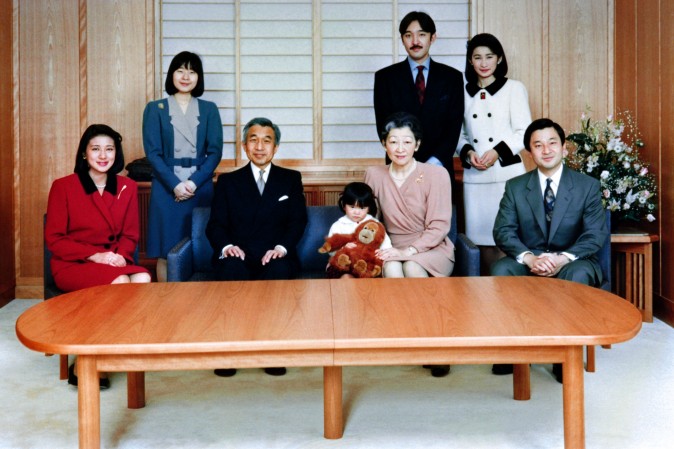 The Japanese Imperial family get together at the Imperial Palace on December 16, 1994 during a photo session for the New Year. Princess Masako (L) became a happy member of the family in this year's session following the July marriage with Crown Prince Naruhito (R). (L-R) Crown Princess Masako, Princess Nori, Emperor Akihito, Princess Mako, Empress Michiko, Prince Akishino, Princess Kiko and Crown Prince Naruhito.  (AFP/Getty Images)