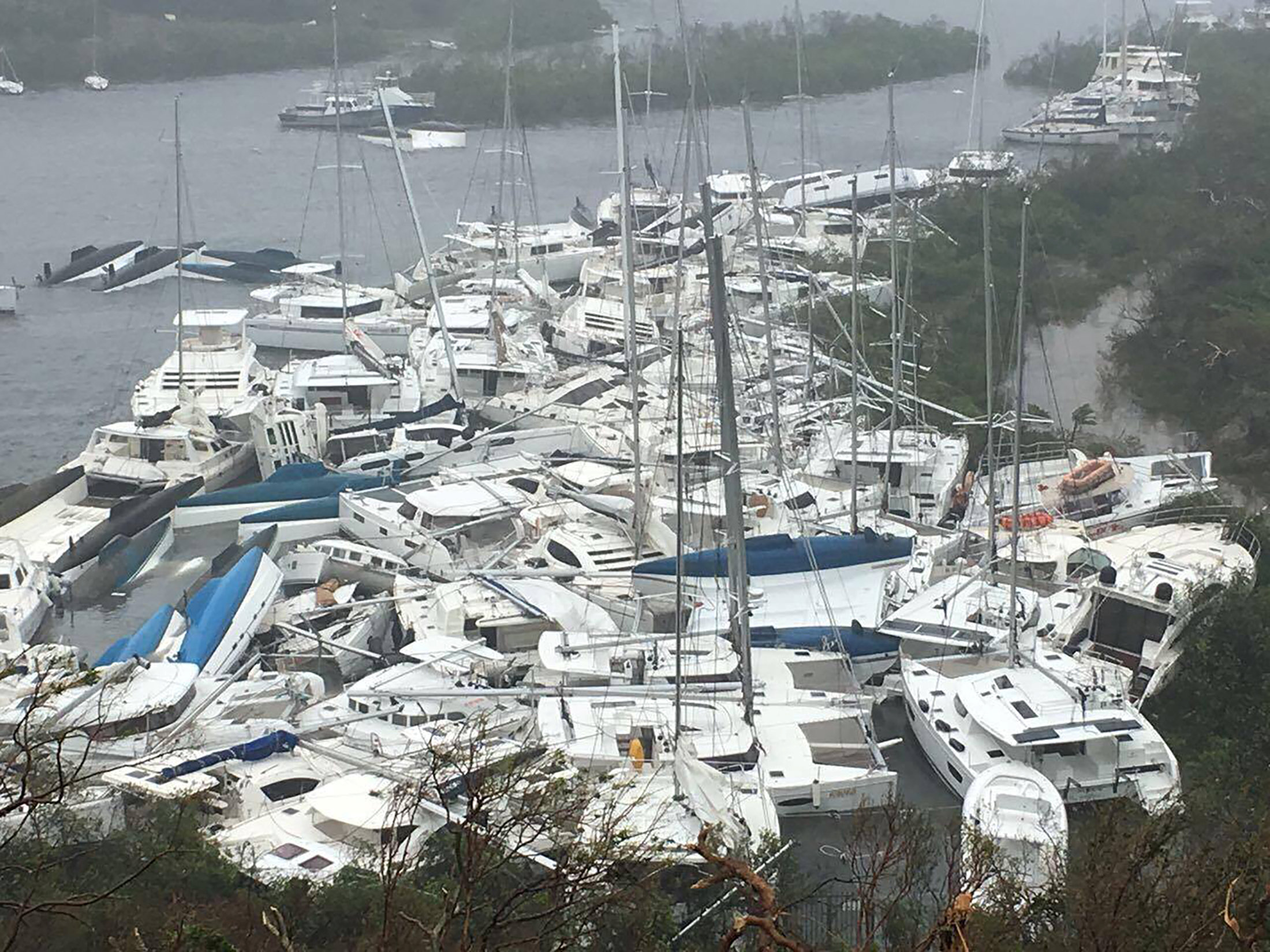 Pleasure craft lie crammed against the shore in Paraquita Bay, Tortola, British Virgin Islands. Courtesy Ron Gurney/via REUTERS
