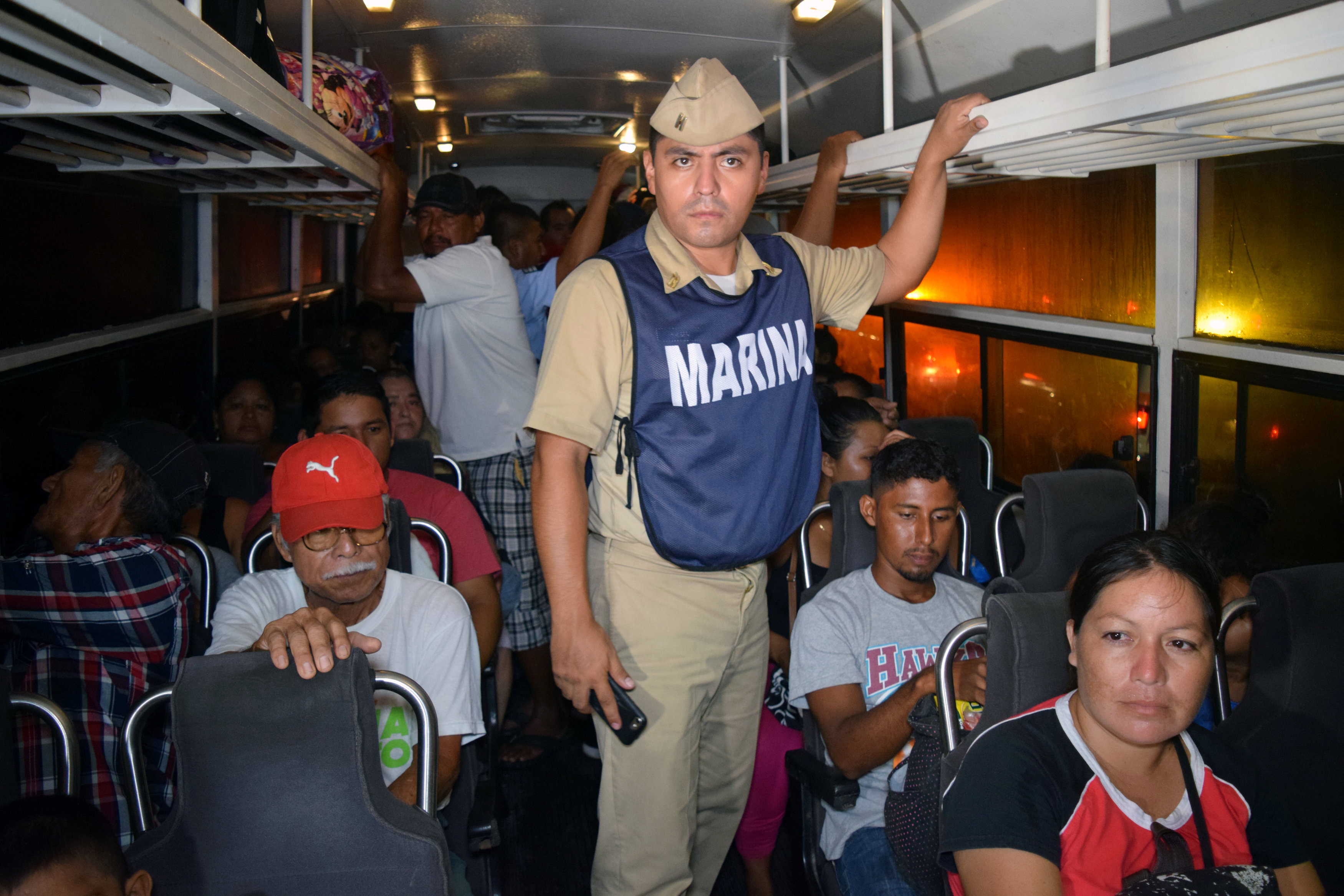 People are seen in a bus as they are being evacuated from their coastal town after an earthquake struck off the southern coast, in Puerto Madero, Mexico on Sept. 8, 2017. (REUTERS/Jose Torres )NO RESALES. NO ARCHIVES