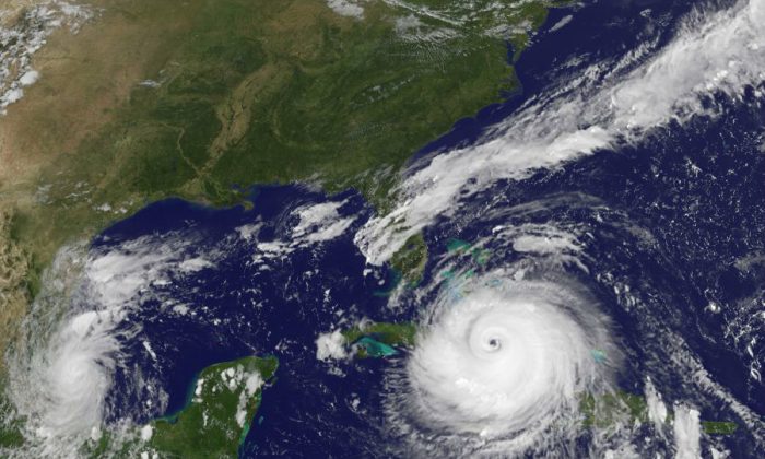 NOAA's GOES satellite shows Hurricane Irma as it moves towards the Florida Coast as a category 4 storm in the Caribbean Sea taken at 14:45 UTC on September 08, 2017.  Hurricane Irma barreled through the Turks and Caicos Islands as a category 4 storm en route to a destructive encounter with Florida this weekend.  (Photo by NOAA GOES Project via Getty Images)