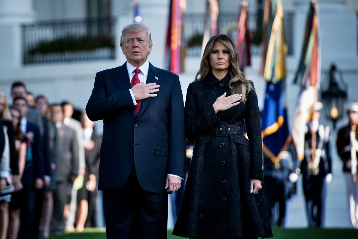 President Donald Trump and First Lady Melania Trump observe a moment of silence during an event to commemorate victims of the Sept. 11, 2001, terrorist attacks, at the White House on Sept. 11, 2017. (Brendan Smialowski/AFP/Getty Images)