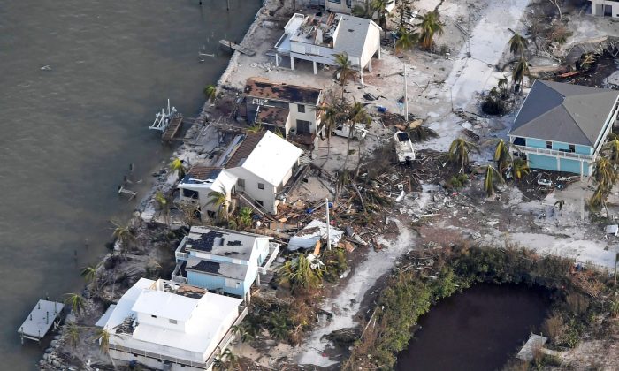 Damaged houses are seen in the aftermath of Hurricane Irma on September 11, 2017 over the Florida Keys, Florida ( Matt McClain -Pool/Getty Images)