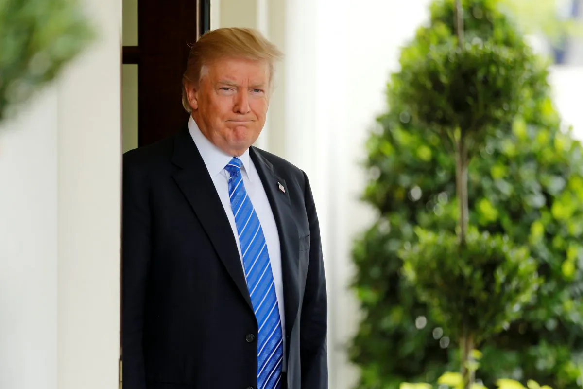 President Donald Trump waits to greet Malaysia's Prime Minister Najib Razak at the White House in Washington on Sept. 12, 2017.  (REUTERS/Jonathan Ernst)