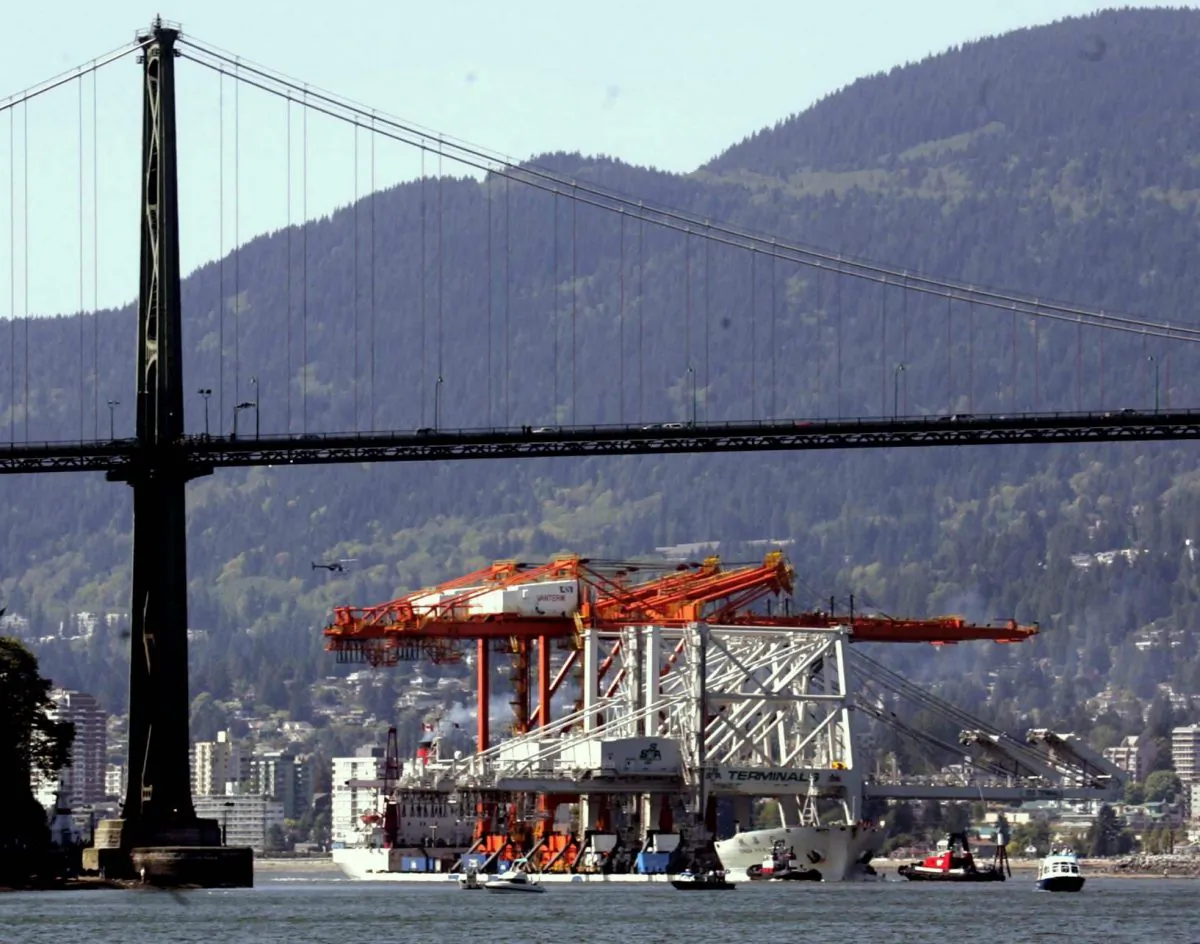 In this file photo a Chinese ship makes its way toward the Lions Gate Bridge into the Port of Vancouver, one of North America's most important gateways to Asia.(CP Photo/Chuck Stoody)