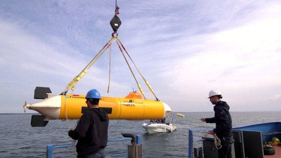 The SonarFish is lowered into the waters of Lake Ontario. (Raise the Arrow)