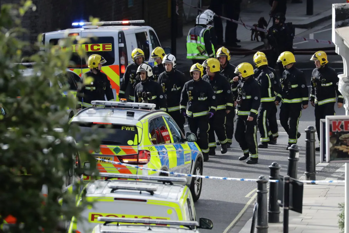 Members of the emergency services work near Parsons Green subway station in London, Britain on Sept. 15, 2017. (Reuters/Kevin Coombs)