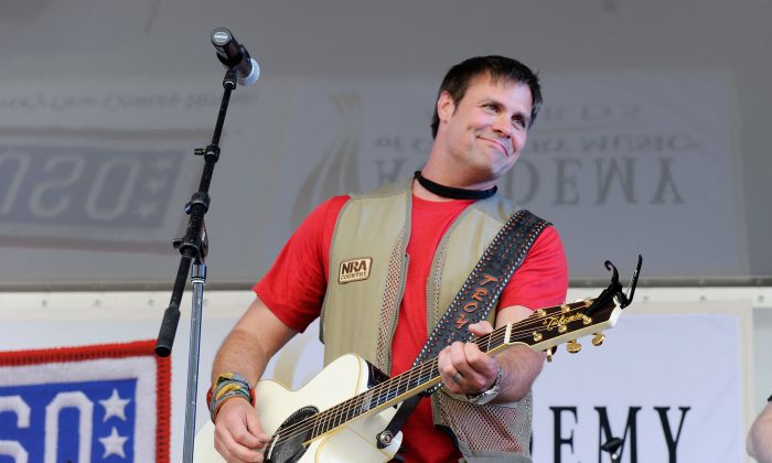 Musician Troy Gentry of the duo Montgomery Gentry performs at the 2nd Annual Academy of Country Music USO Concert at Nellis Air Force Base on April 2, 2011 in Las Vegas, Nevada.  (Ethan Miller/Getty Images)